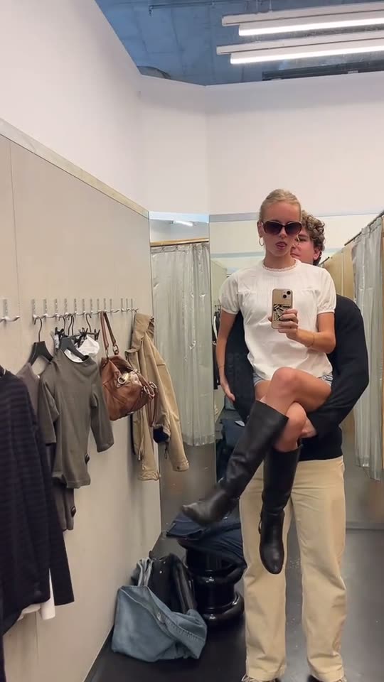 Couple posing in changing room