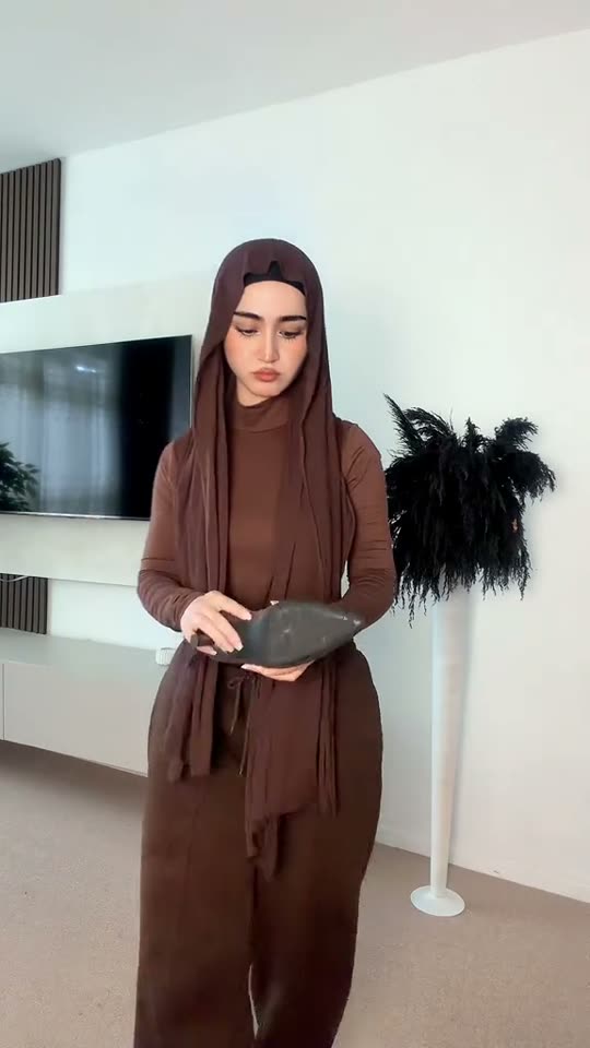Brown outfit to black dress