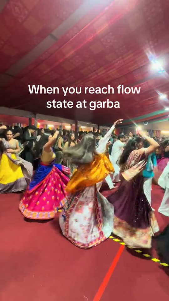 People dancing Garba at event