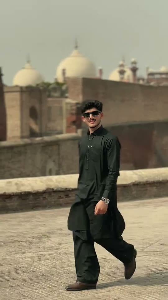 Man walking in traditional attire