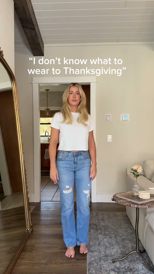 Woman shows Thanksgiving outfit ideas