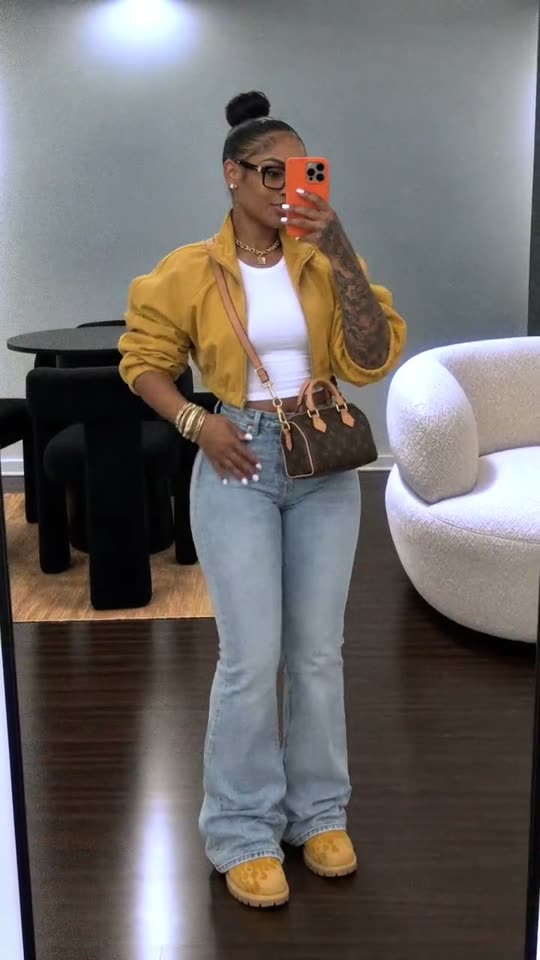 Woman showing off Thanksgiving outfit