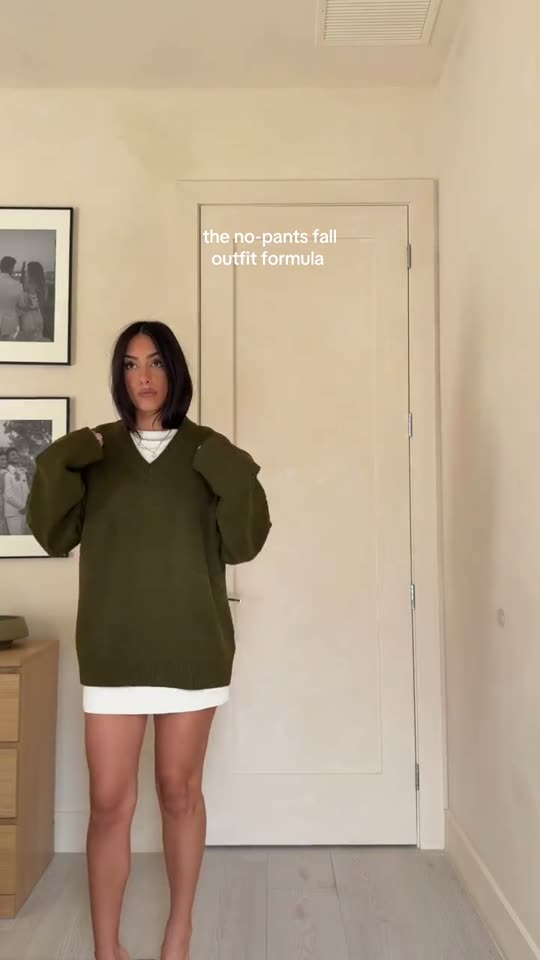 Woman models fall outfit