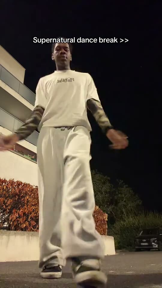 Man dancing at night