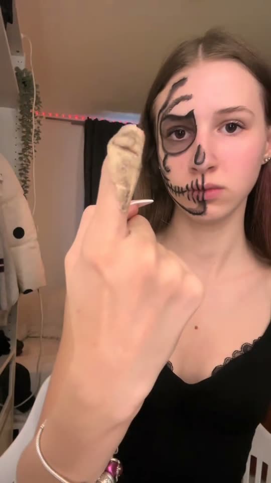 Half-face skeleton makeup reveal