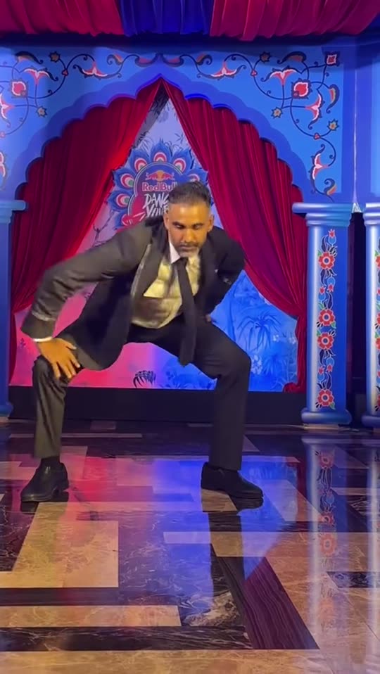 Man in suit dancing
