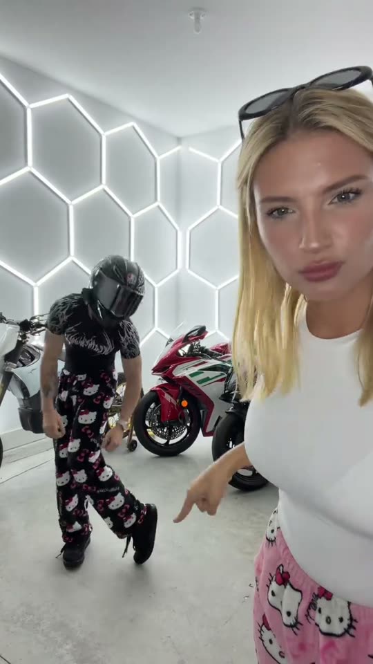 Couple dancing in garage