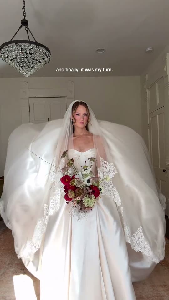 Bride in wedding dress reveal