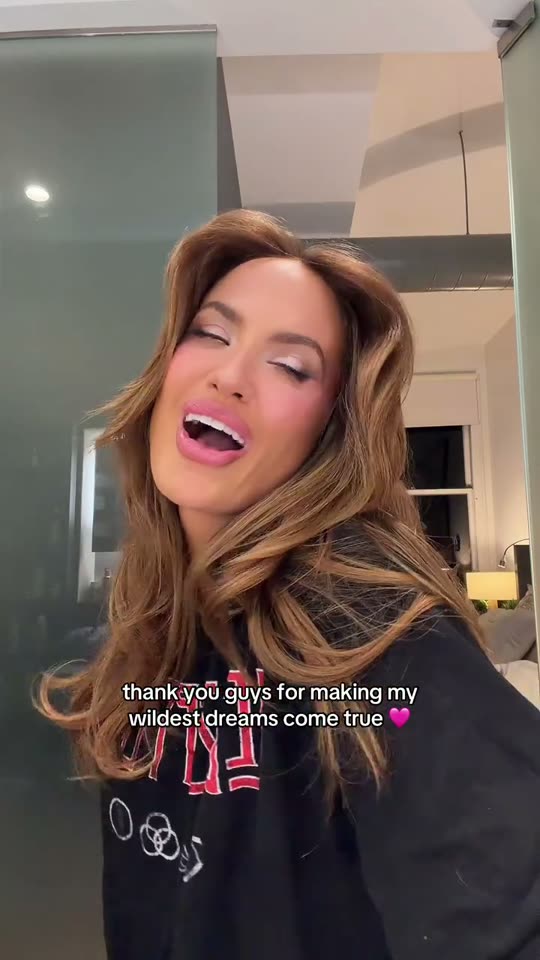 Woman lip syncs to music